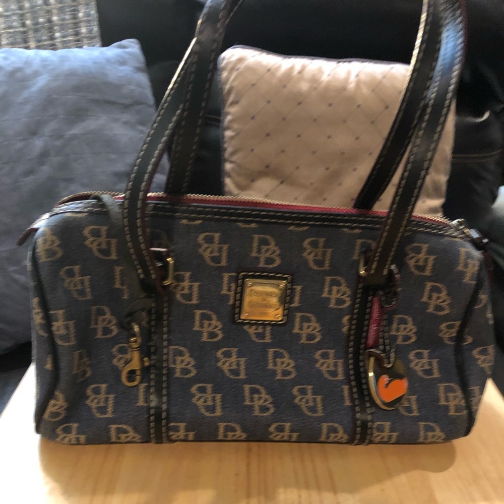 “Barrel” style Dooney & Bourke handbag